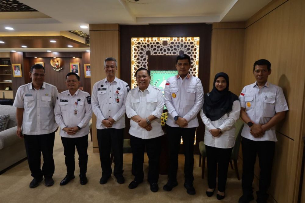 Perkuat Sinergi Lintas Sektoral, Kakanwil Kemenkum Riau Temui Plt Gubernur Bahas Optimalisasi Layanan Hukum